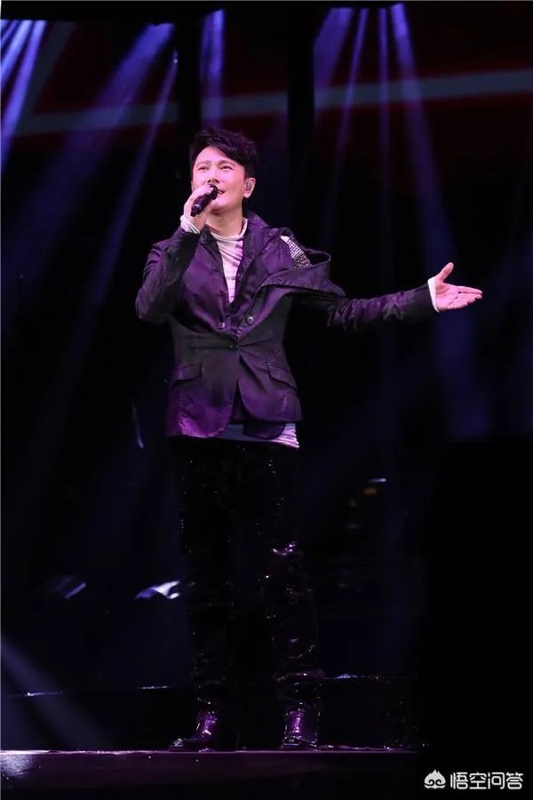 张信哲《用情》《过火》，也难抵《爱就一个字》？你难抵的是哪一首情歌？